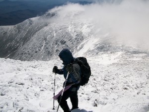 Checking out the views as the clouds part near the summit.