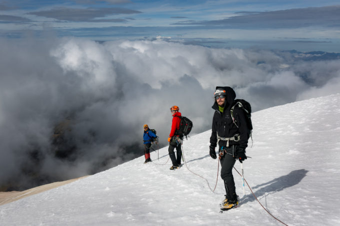 An exhausted but happy team after reaching the summit of all 4 mountains in 10 days.  In a 6 hour span, we went from 19,000ft to eating steaks in town. Where else in the world is that possible?